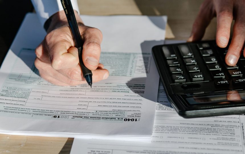 businessman-calculate-individual-income-tax-return-2026-01-06-00-49-56-utc